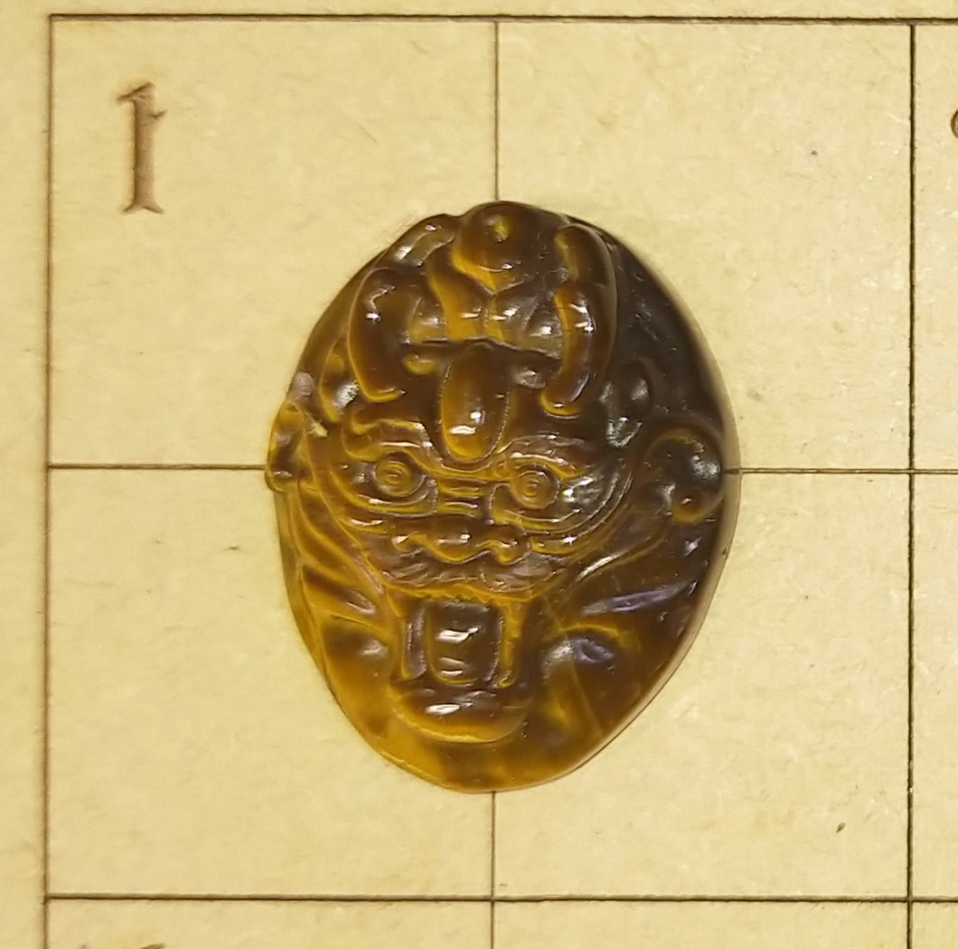 Tigers eye carved dragon pendant